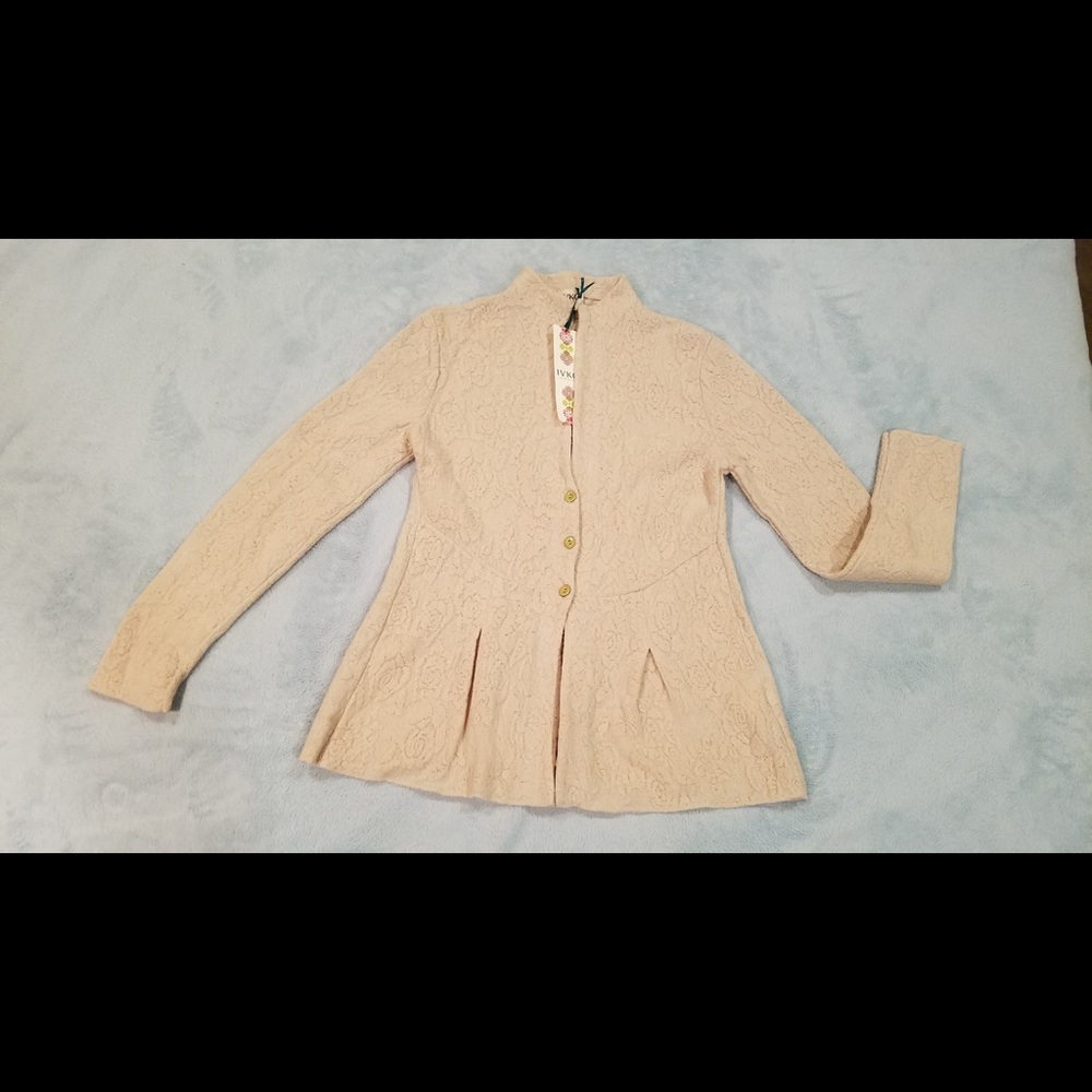 IVKO jacket with pleats.